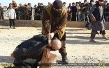 İŞİD falçının başın balta ilə kəsdi