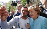 Merkel  suriyalı qaçqınların düşərgəsində