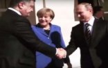 Merkel Poroşenko və Putini əl sıxmağa məcbur elədi