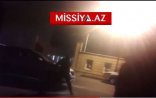 Xanım sürücü avtomobilini polisin üzərinə sürdü - Bakıda + VİDEO