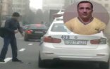 Avtomobili çəkiclə əzilən yol polisi işdən çıxarılıb