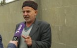 Telefonda ölüyə quran oxutdurmaq olarmı? Molla iddia edir ki...+ VİDEO