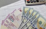 10 min dollardan çox kredit borcu olanlara da güzəşt ediləcək