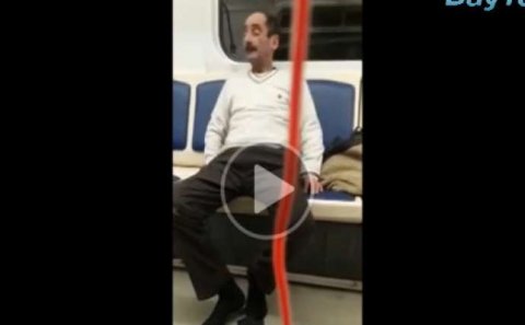 Bakı metrosunda sərxoş kişi qızı qorxutdu - Video