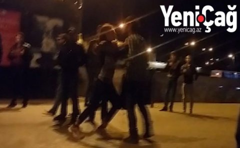 Bakıda arvad əri ilə uşağını küçənin ortasında döydü - VİDEO
