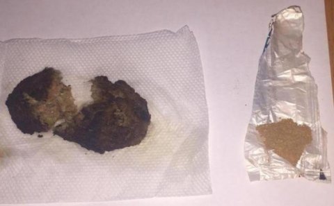 Həbsdə olan ərinə heroin gətirən qadın saxlanılıb